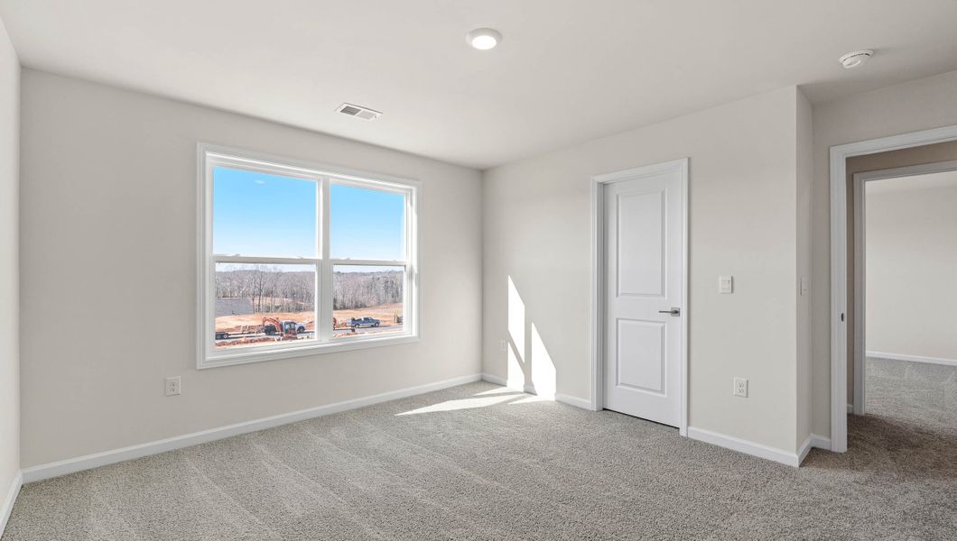 Spacious, unfurnished interior of a new home in Adams Glen, Greenville (Image 16). Spacious, unfurnished interior of a new home in Adams Glen, Greenville (Image 16).