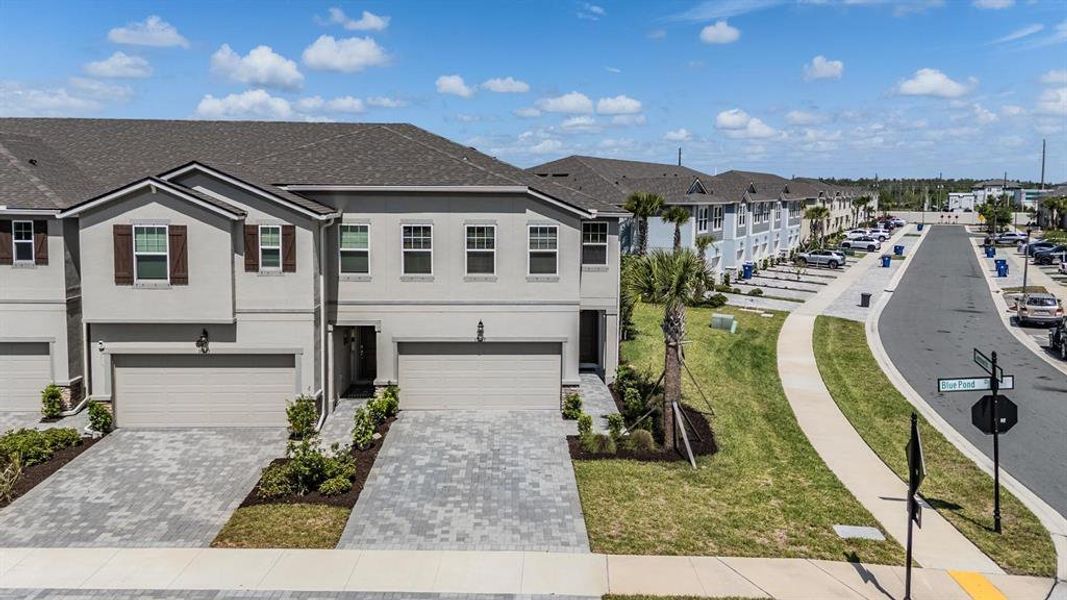 Front exterior of a new home in , Lutz, FL, highlighting curb appeal (Image 25).