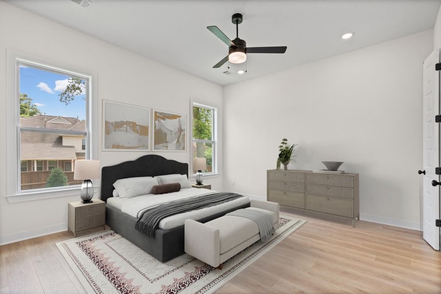 Bright room featuring light wood-finish flooring, a contemporary ceiling fan, and recessed lighting Bright room featuring light wood-finish flooring, a contemporary ceiling fan, and recessed lighting