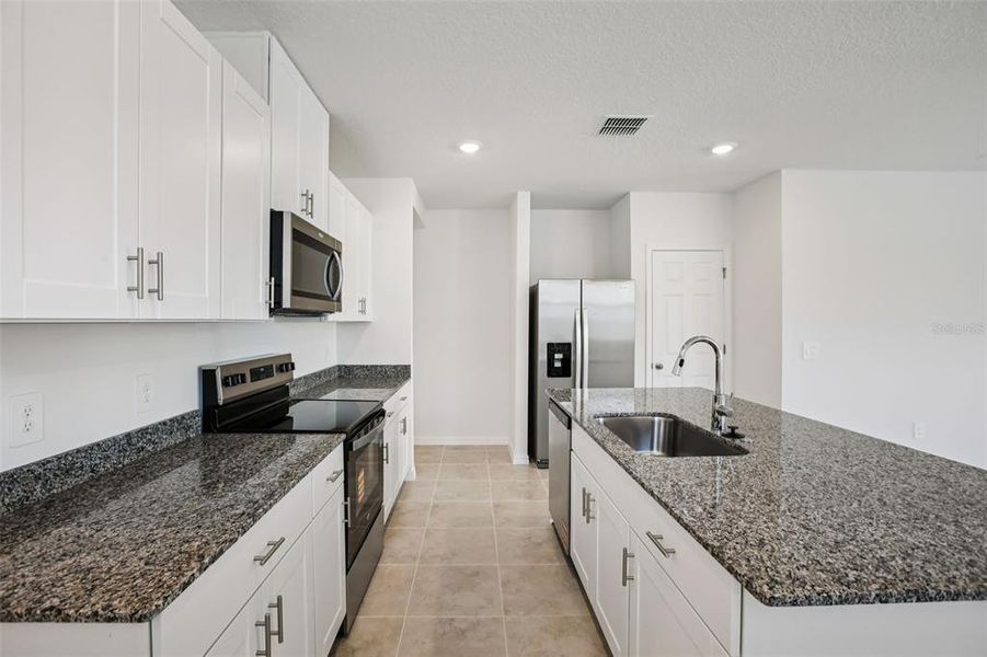 Furnished interior view inside a new home in Villamar - Classic Series, Winter Haven (Image 7).