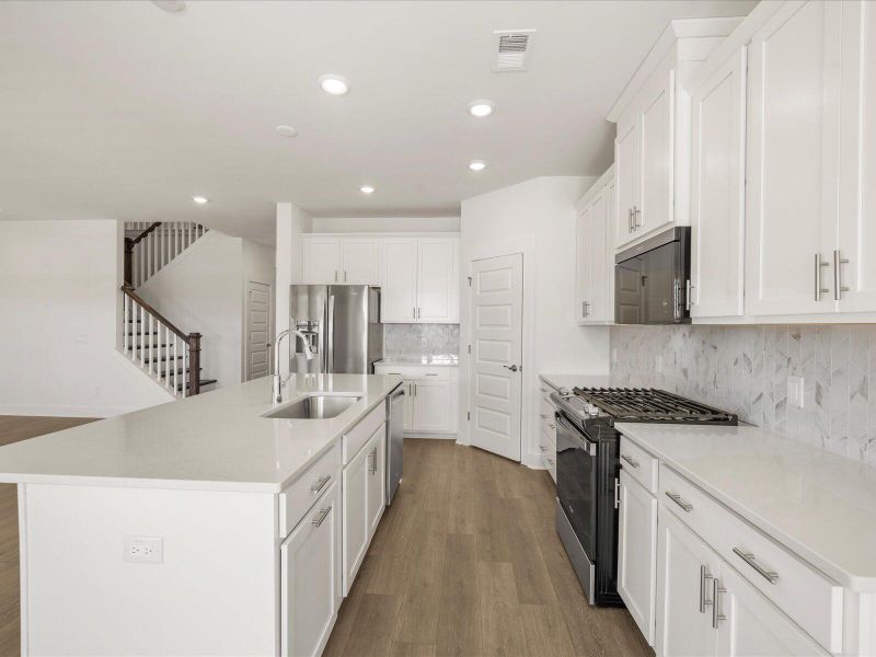Furnished interior view inside a new home in The Coves at Lakes of Cane Bay II, Summerville (Image 6).