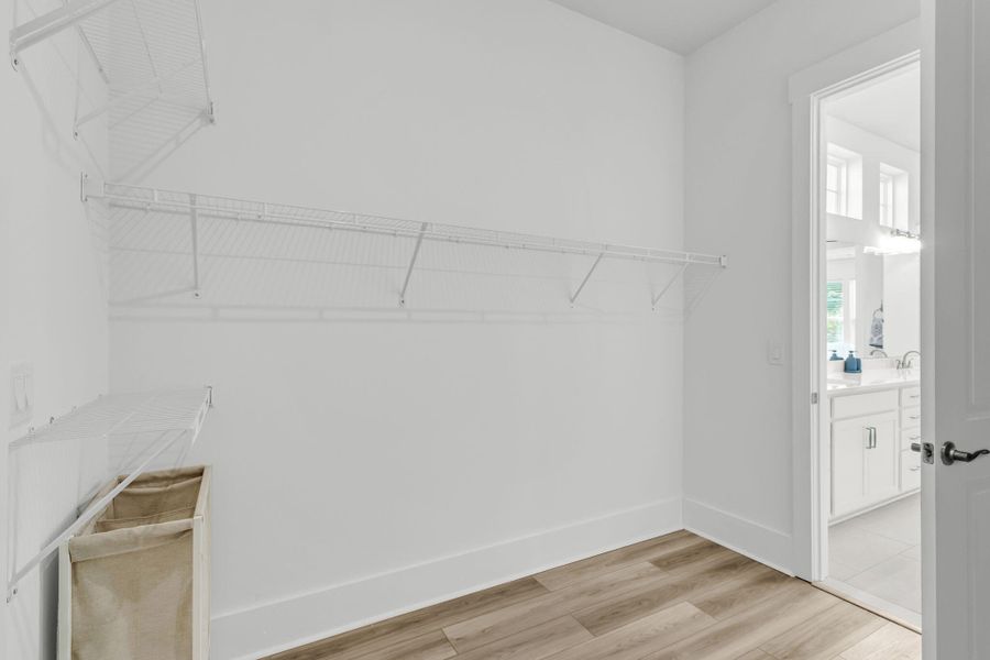 Spacious, unfurnished interior of a new home in Summerwind Crossing at Lakes of Cane Bay, Summerville (Image 22).