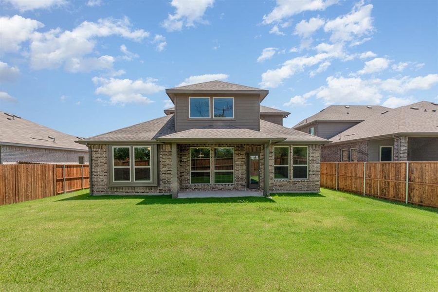 Front exterior of a new home in Courts Of Bonnie Brae, Denton, TX, highlighting curb appeal (Image 1).