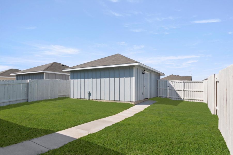 Front exterior of a new home in Casetta Ranch, Kyle, TX, highlighting curb appeal (Image 17). Front exterior of a new home in Casetta Ranch, Kyle, TX, highlighting curb appeal (Image 17).