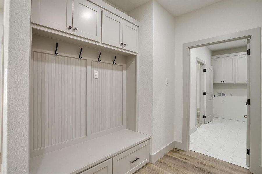 Mudroom featuring light hardwood / wood-style floors