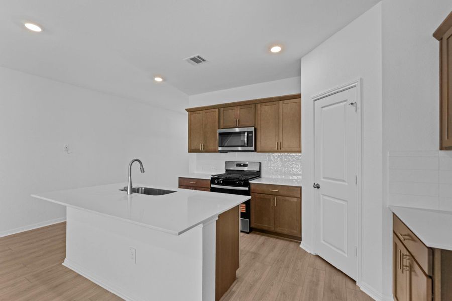 Furnished interior view inside a new home in Palomino, Manor (Image 7).