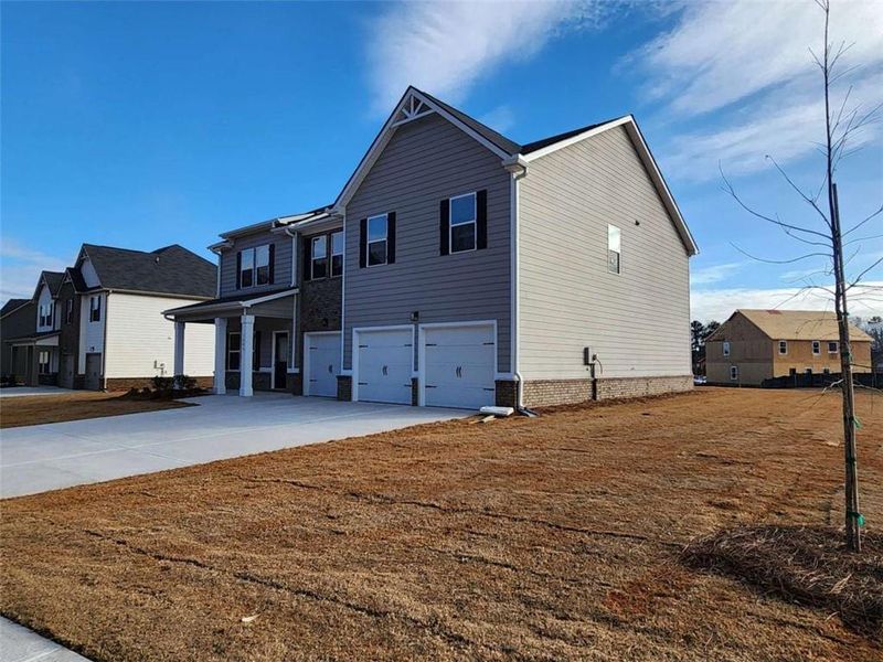 Exterior details and patio area of a home in Southern Hills, McDonough (Image 3).