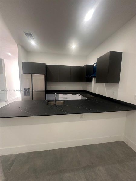 Furnished interior view inside a new home in , Fort Lauderdale (Image 9). Furnished interior view inside a new home in , Fort Lauderdale (Image 9).