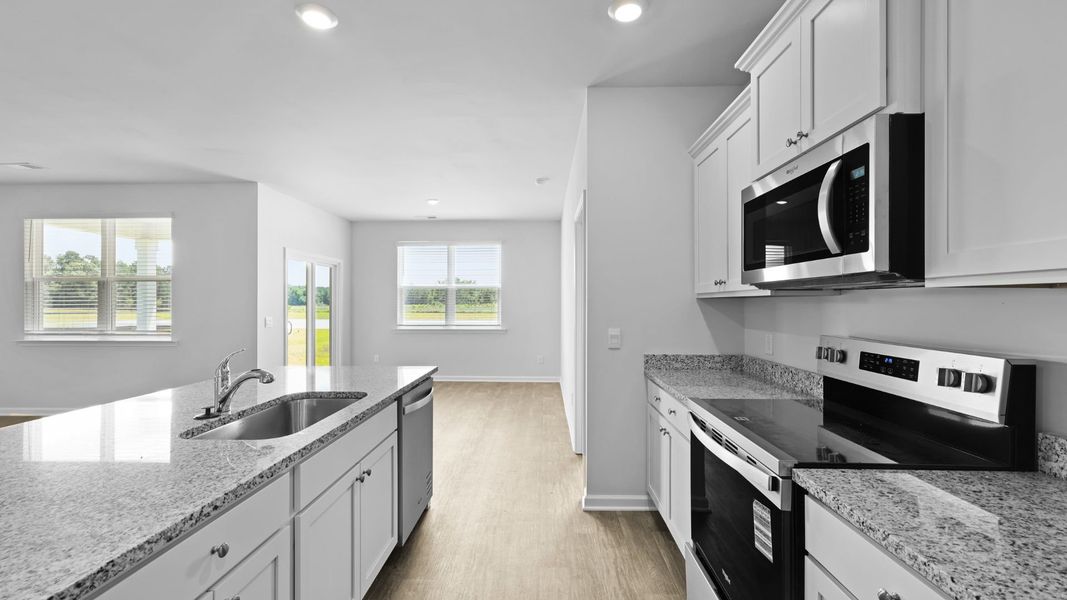 Representative furnished interior of a home built from the ARIA by D.R. Horton in The Ranch, Holly Hill (Image 4).