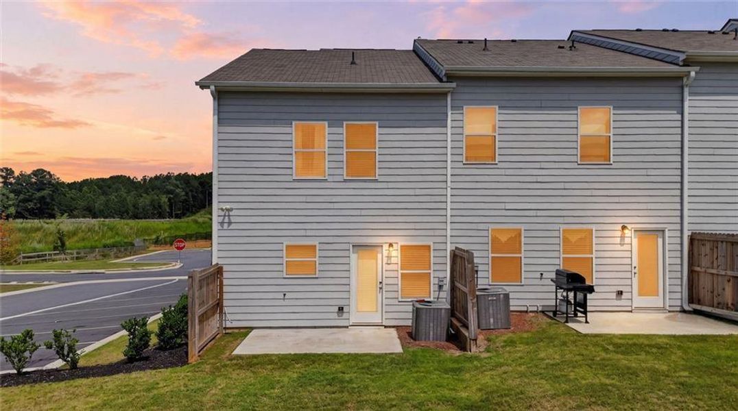 Exterior details and patio area of a home in Fuller Station, Loganville (Image 30).