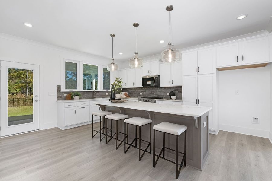 Furnished interior view inside a new home in Stonebridge Fairways, Monroe (Image 3).