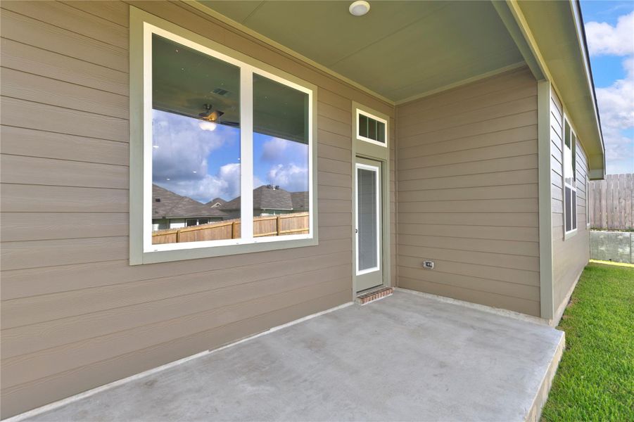 Exterior details and patio area of a home in Vintage Farms, Brenham (Image 32).