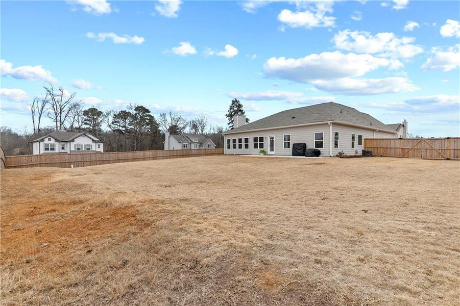 Exterior details and patio area of a home in Laurel Cove, Hoschton (Image 23).