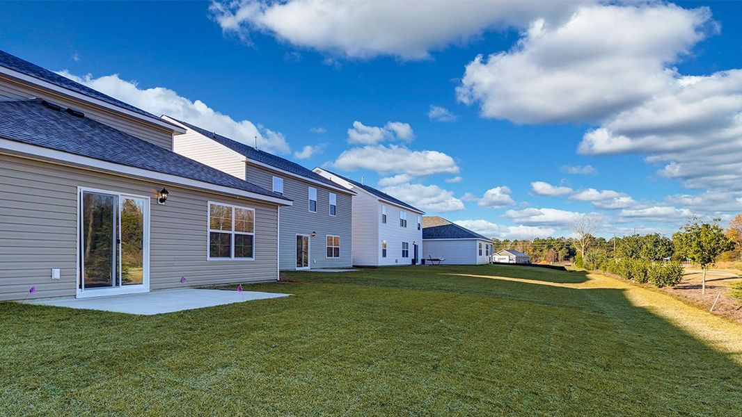 Exterior details and patio area of a home in Hunter's Branch, Hopkins (Image 26).