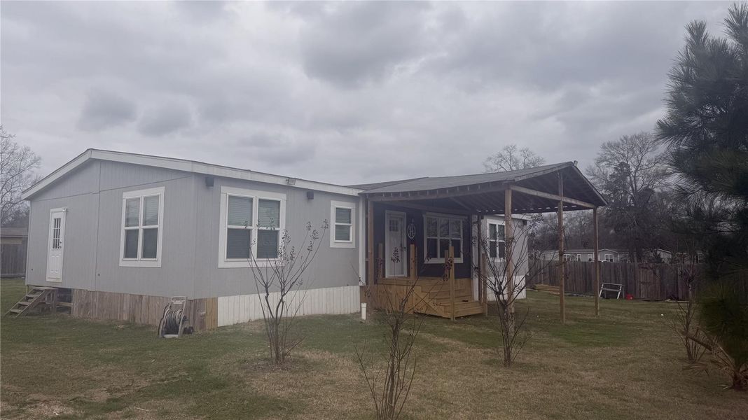 Exterior details and patio area of a home in , Conroe (Image 2). Exterior details and patio area of a home in , Conroe (Image 2).