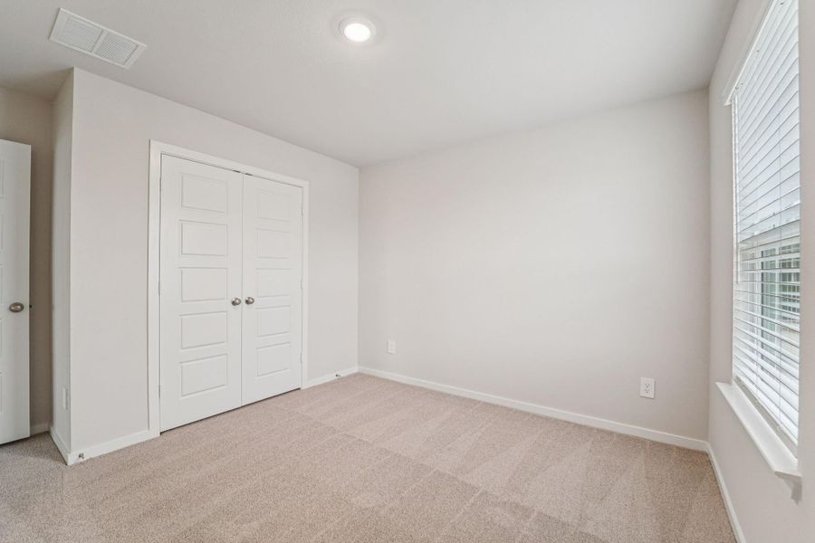 Spacious, unfurnished interior of a new home in Granger Pointe - Premier Series, Conroe (Image 30).