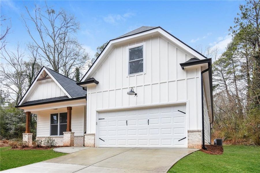 Front exterior of a new home in , Lilburn, GA, highlighting curb appeal (Image 19). Front exterior of a new home in , Lilburn, GA, highlighting curb appeal (Image 19).
