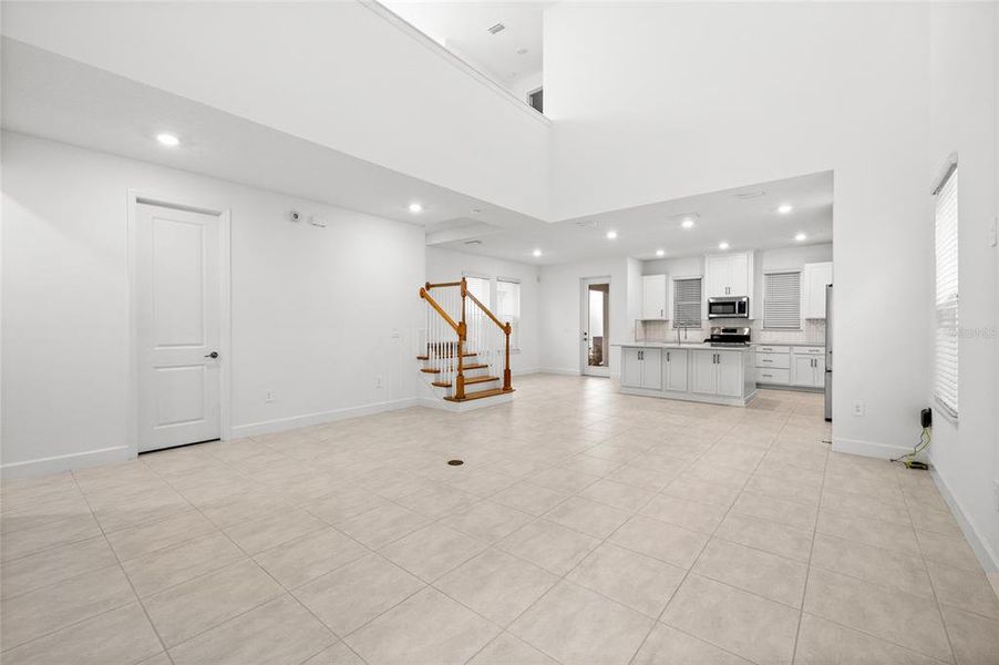 Spacious, unfurnished interior of a new home in Harvest At Ovation 50s, Winter Garden (Image 26).