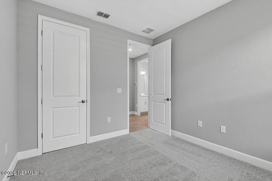 Spacious, unfurnished interior of a new home in Colbert Landings, Palm Coast (Image 16).