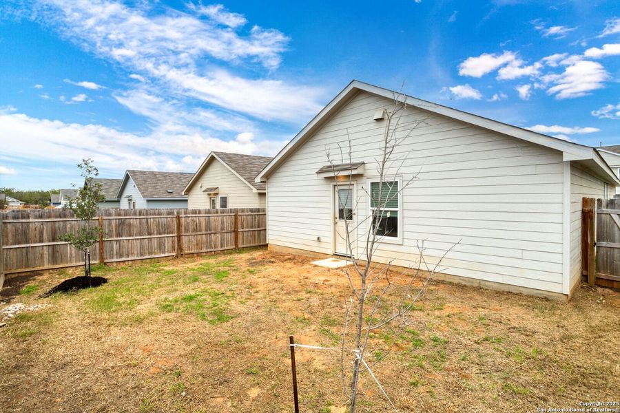 Exterior details and patio area of a home in Ruby Crossing: Cottage Collection, San Antonio (Image 4).
