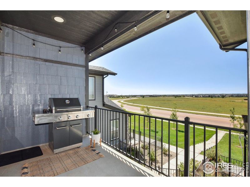 Front exterior of a new home in , Timnath, CO, highlighting curb appeal (Image 20).