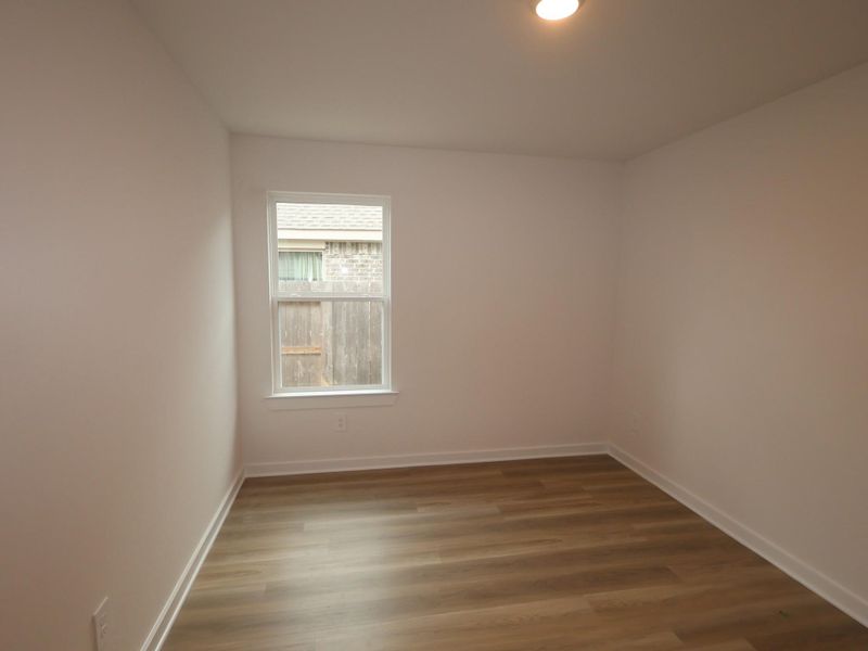 Spacious, unfurnished interior of a new home in Pinewood at Grand Texas, New Caney (Image 28).