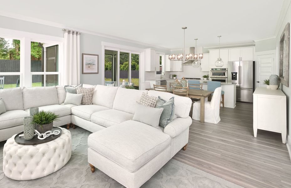 Large gathering room that looks over the dining an