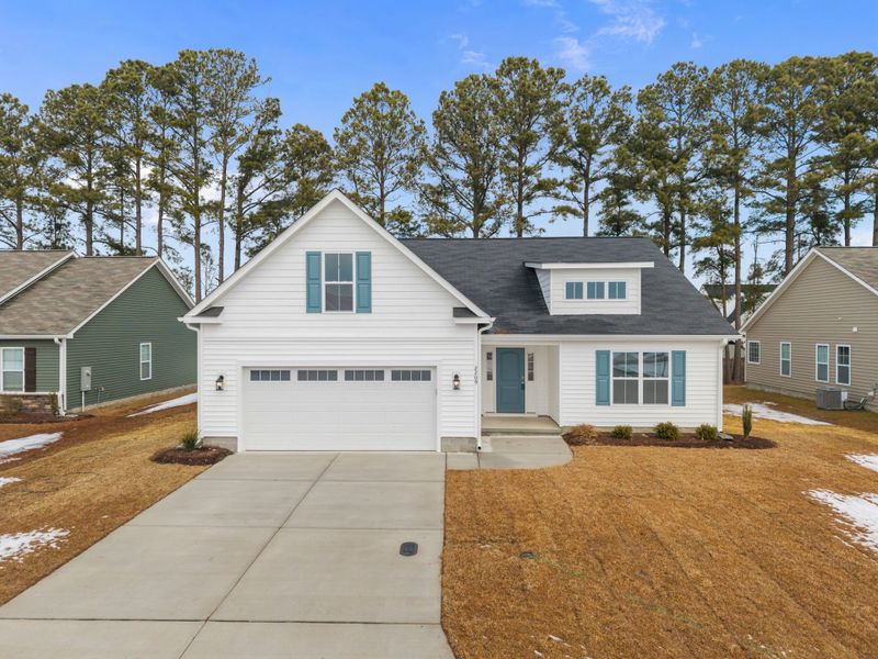 Front exterior of a new home in Davenport Farms, Winterville, NC, highlighting curb appeal (Image 22).
