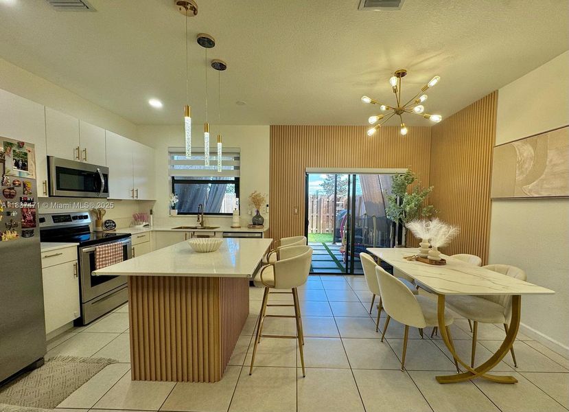 Furnished interior view inside a new home in , Homestead (Image 8). Furnished interior view inside a new home in , Homestead (Image 8).