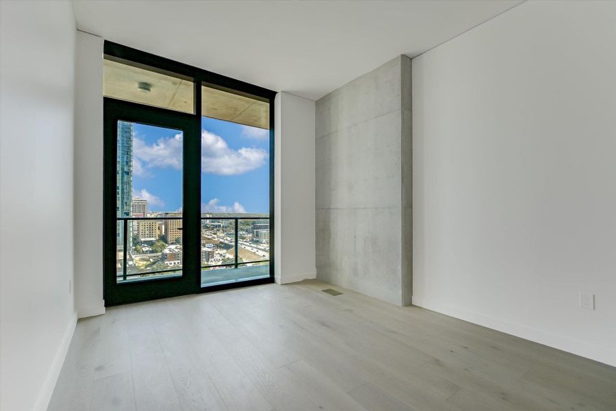 Spacious, unfurnished interior of a new home in The Modern Austin Residences, Austin (Image 11). Spacious, unfurnished interior of a new home in The Modern Austin Residences, Austin (Image 11).