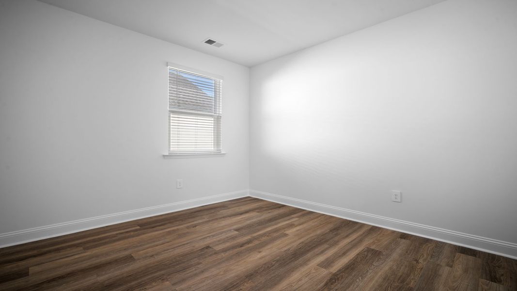 Spacious, unfurnished interior of a new home in The Lakes at North Glynn, Brunswick (Image 21).