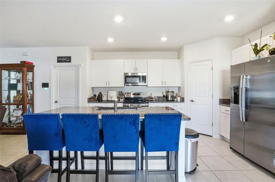 Furnished interior view inside a new home in The Isle of Avalon, Spring Hill (Image 15).