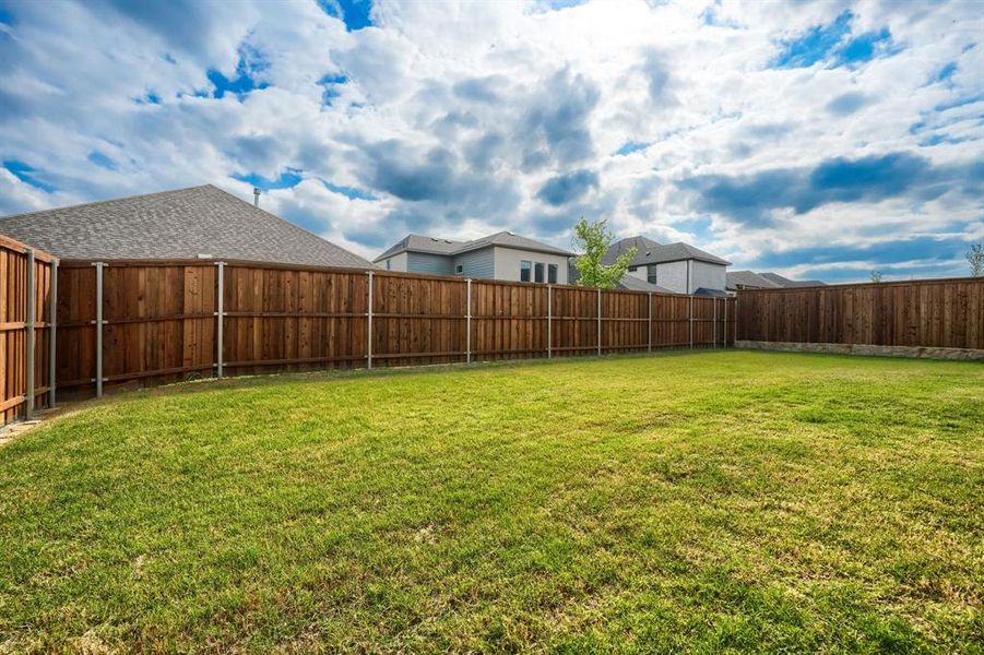 Exterior details and patio area of a home in Cross Creek Meadows, Celina (Image 27).