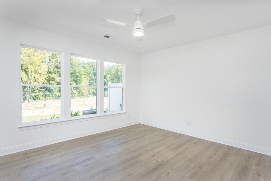 Spacious, unfurnished interior of a new home in Running Brook Townes, Durham (Image 10).