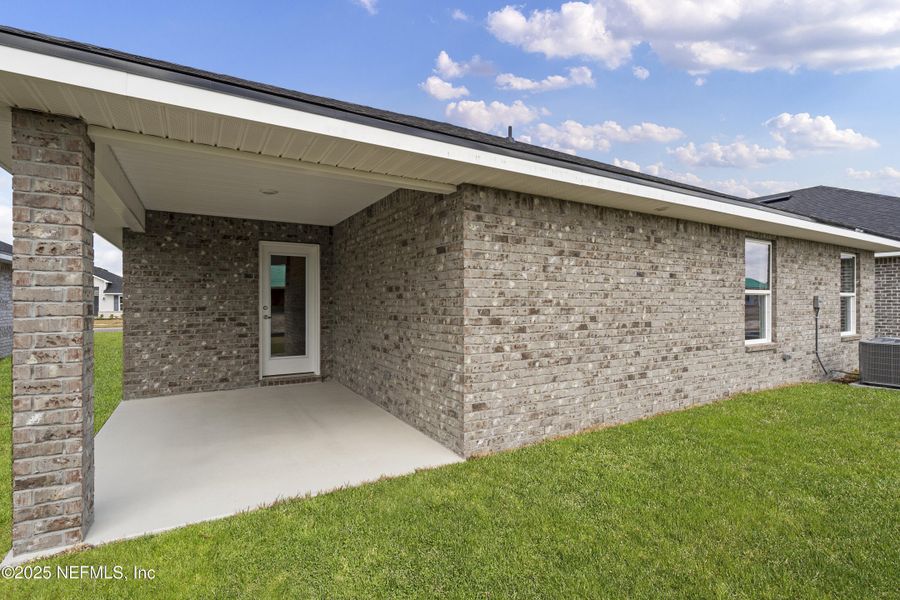 Exterior details and patio area of a home in , Green Cove Springs (Image 2). Exterior details and patio area of a home in , Green Cove Springs (Image 2).