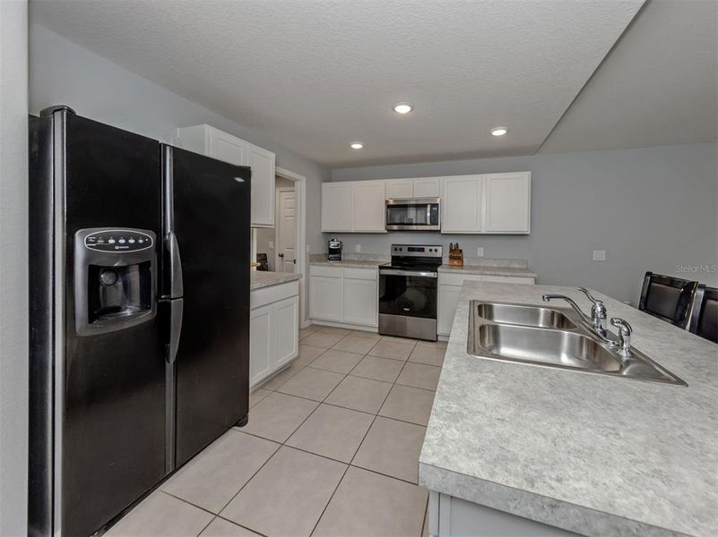 Furnished interior view inside a new home in , Port Charlotte (Image 31).