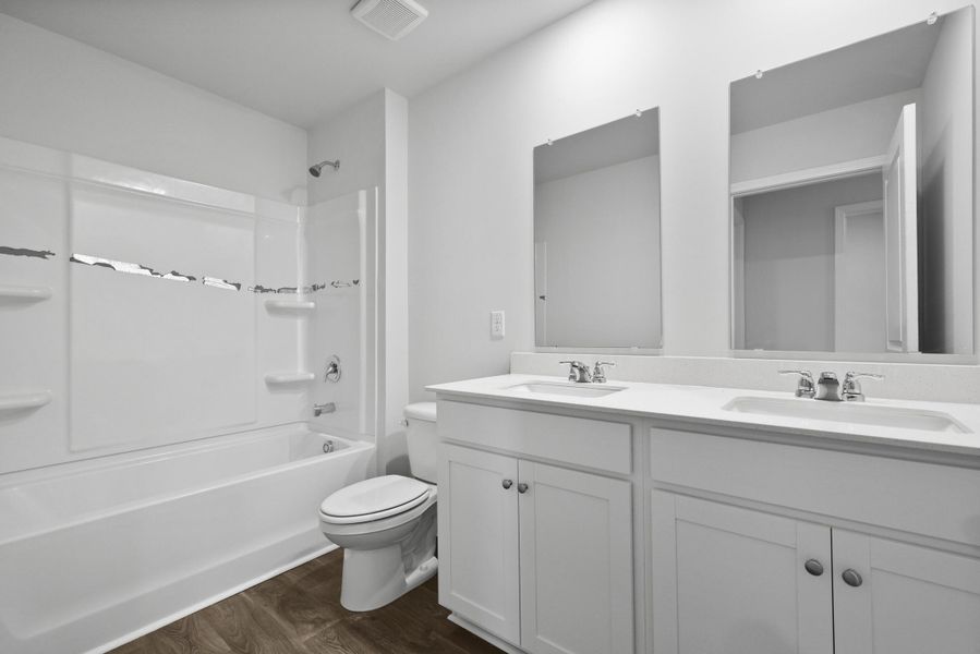 Furnished interior view inside a new home in Pine Hills at Cane Bay, Summerville (Image 4).