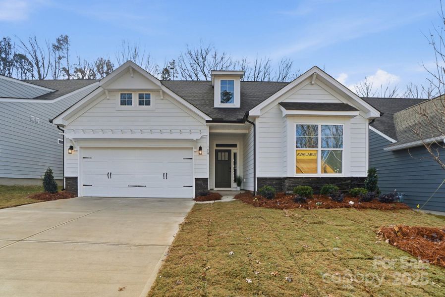 Front exterior of a new home in Villas at Prestwick, Mooresville, NC, highlighting curb appeal (Image 1).