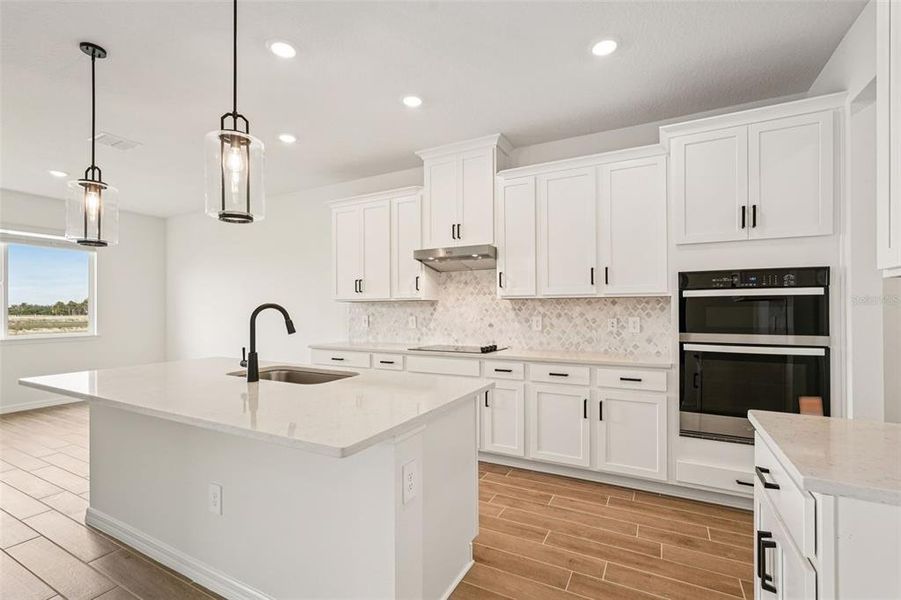 Furnished interior view inside a new home in Oakfield Trails - Signature Series, Parrish (Image 6).