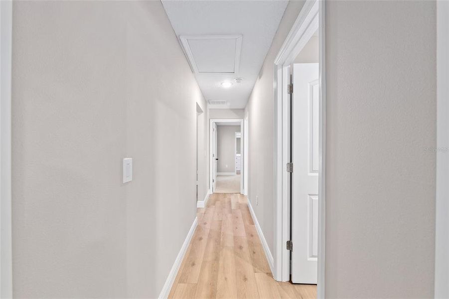 Hallway to the three bedrooms