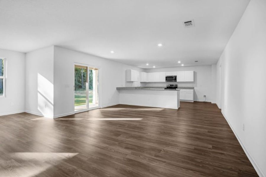 A large empty living room. A large empty living room.