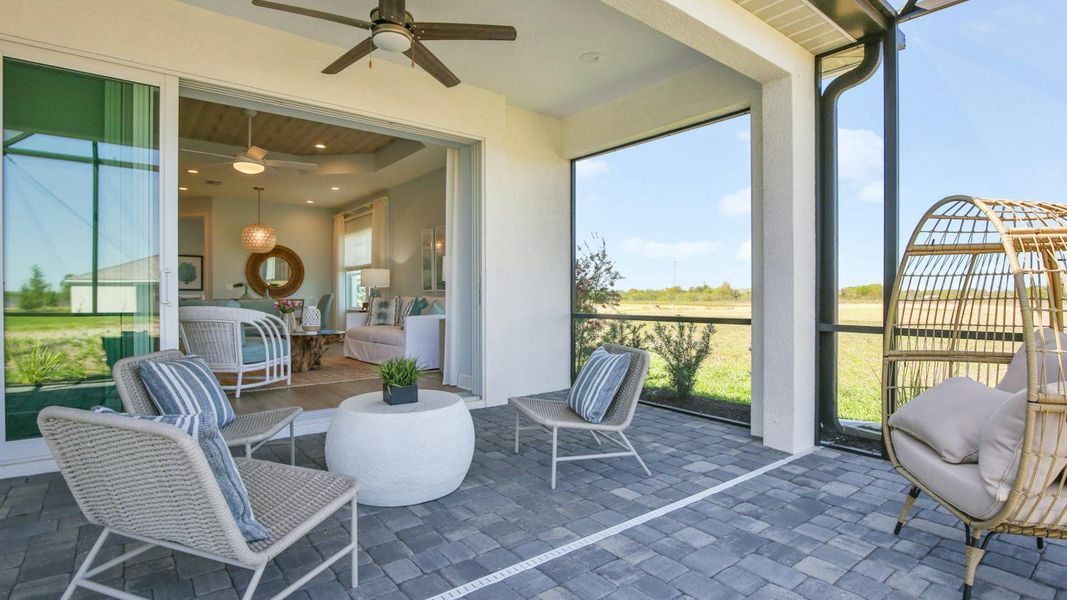 Exterior details and patio area of a home in Palm Grove Real Estate and Homes for Sale in Lakewood Ranch, FL - Neal Communities, Lakewood Ranch (Image 3).