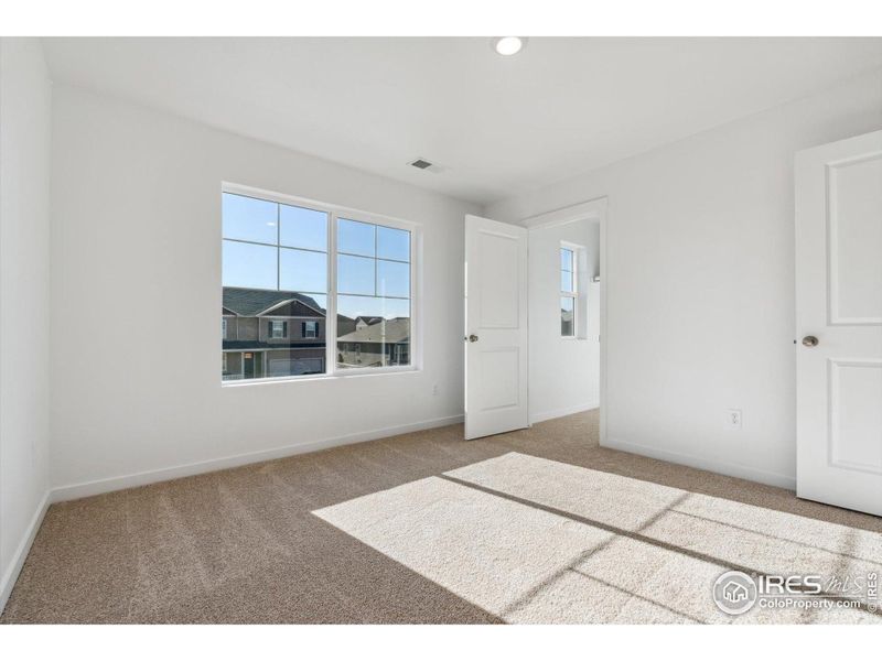 Spacious, unfurnished interior of a new home in Silver Peaks, Lochbuie (Image 19).