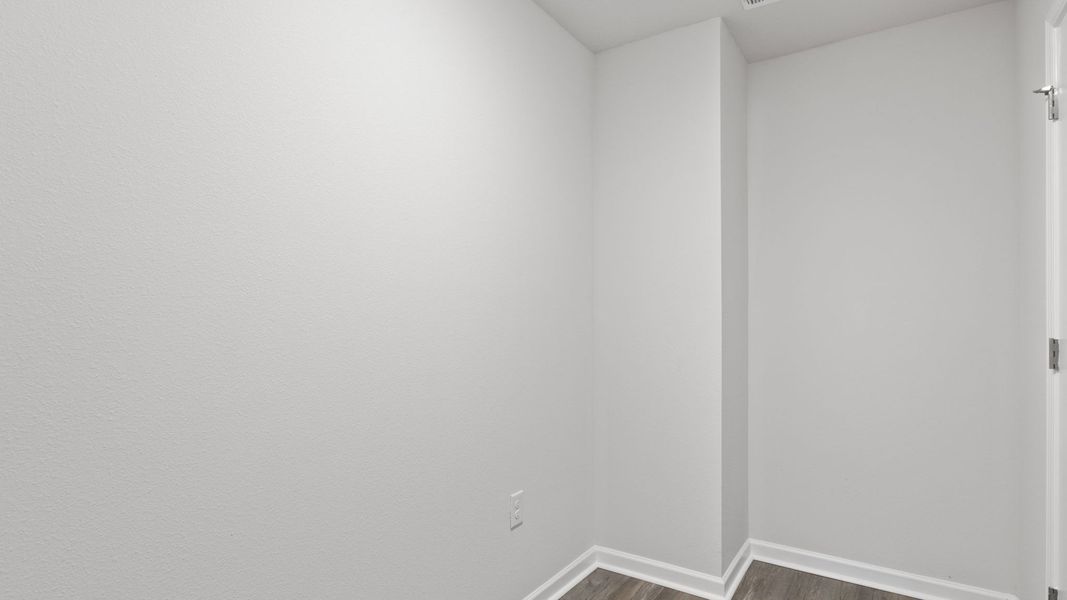 Representative unfurnished interior of a home built from the The Lismore by D.R. Horton in Magnolia at the Bluffs Phase 3, Freeport (Image 25).