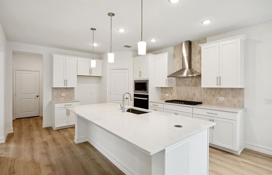 Eat-in island and pendant lighting *real home pictured Eat-in island and pendant lighting *real home pictured