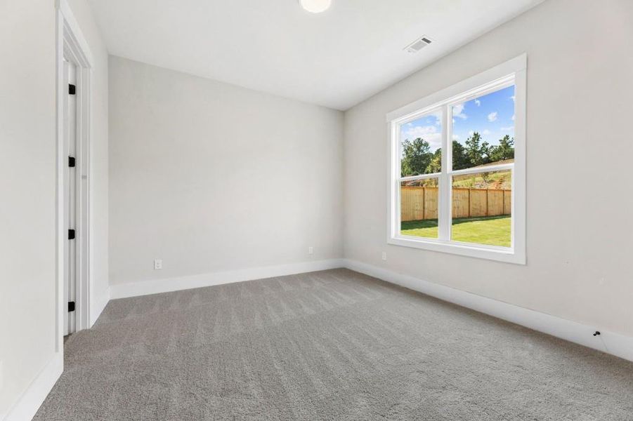 Spacious, unfurnished interior of a new home in Hillshire, Cumming (Image 24).