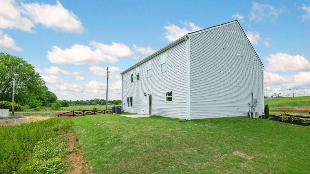 Exterior details and patio area of a home in Sweet Briar, Ooltewah (Image 22).