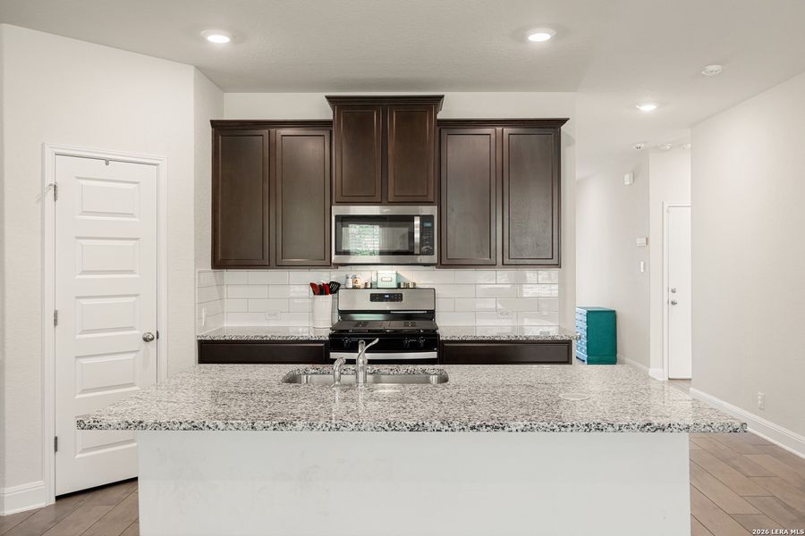 Furnished interior view inside a new home in Riverstone at Westpointe, San Antonio (Image 11).