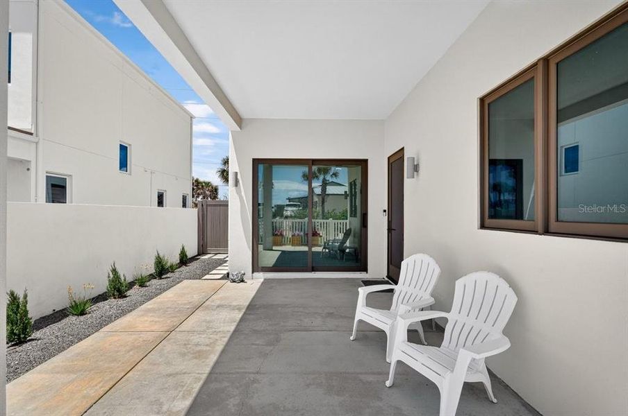 Exterior details and patio area of a home in , New Smyrna Beach (Image 34).
