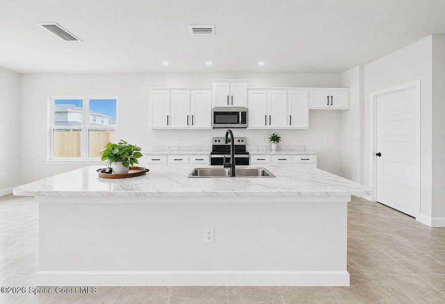 Furnished interior view inside a new home in St. John's Preserve, Palm Bay (Image 4).